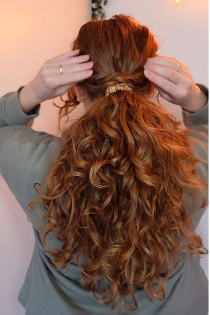 curly low ponytail hairstyle