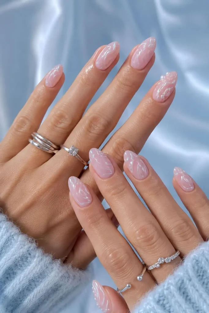 3D icy chrome nails with abstract raised swirl designs