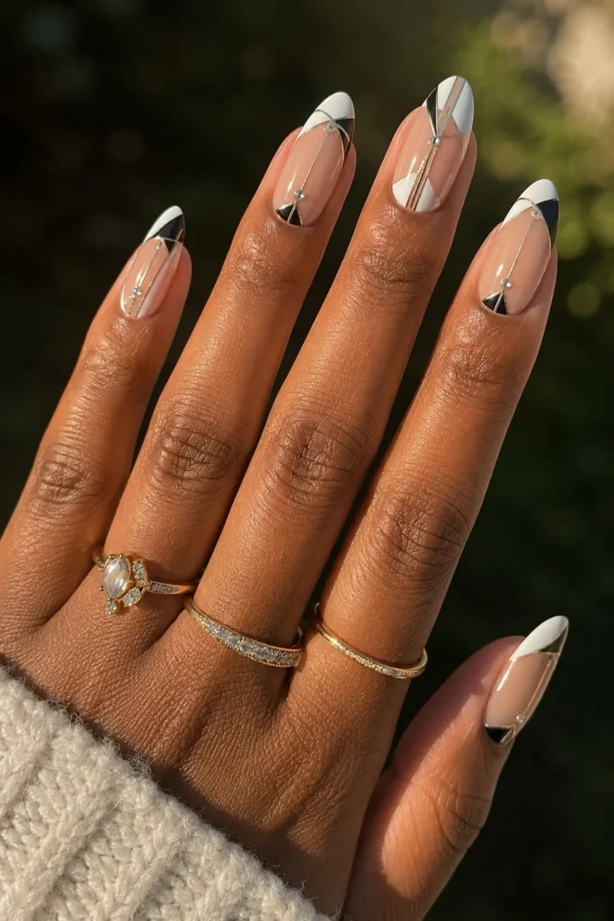 Art Deco graduation nails with geometric details, negative space and rhinestones