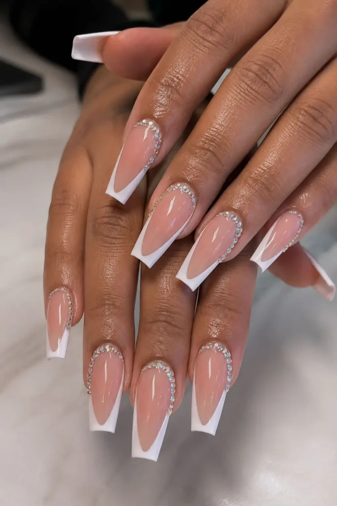 Bedazzled French coffin nails with delicate rhinestone accents