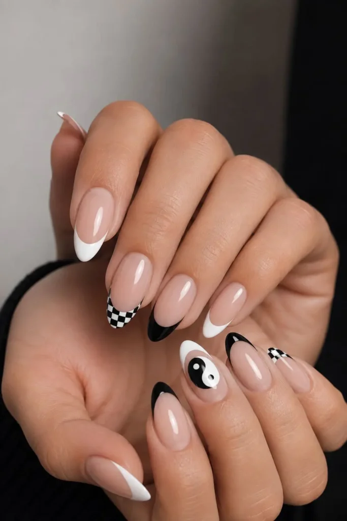 Black and white French tip nails with modern monochrome accents