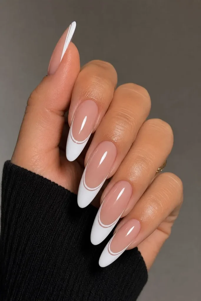 Bold French tip nails with oversized French tips
