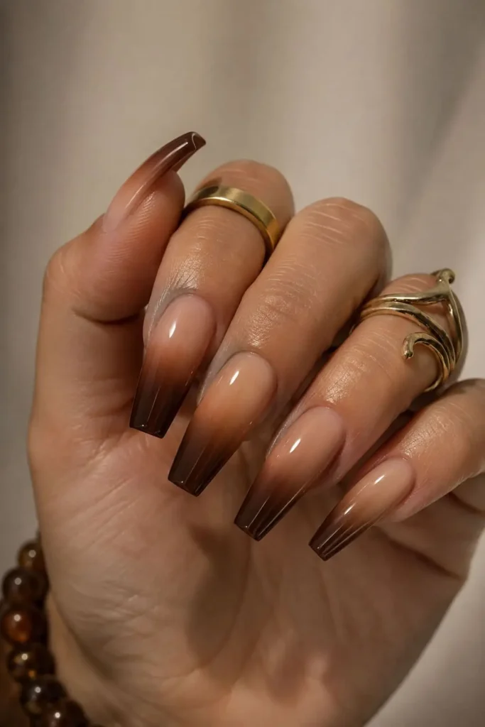 Brown ombre coffin nails with a rich espresso gradient