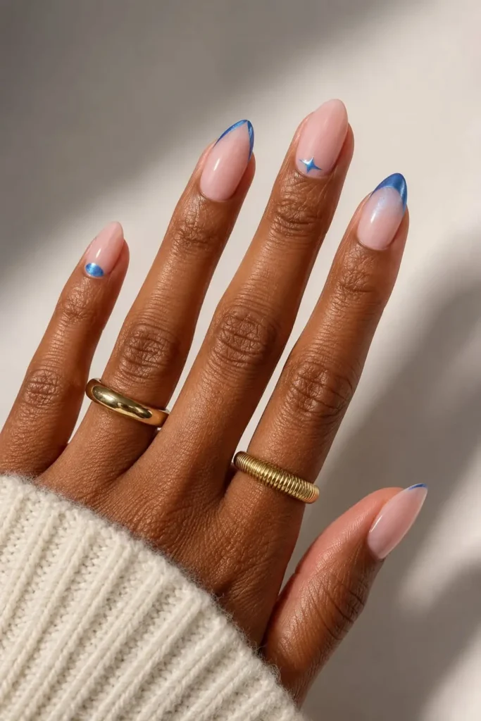 Bubble Bath nails with metallic blue French tip accents