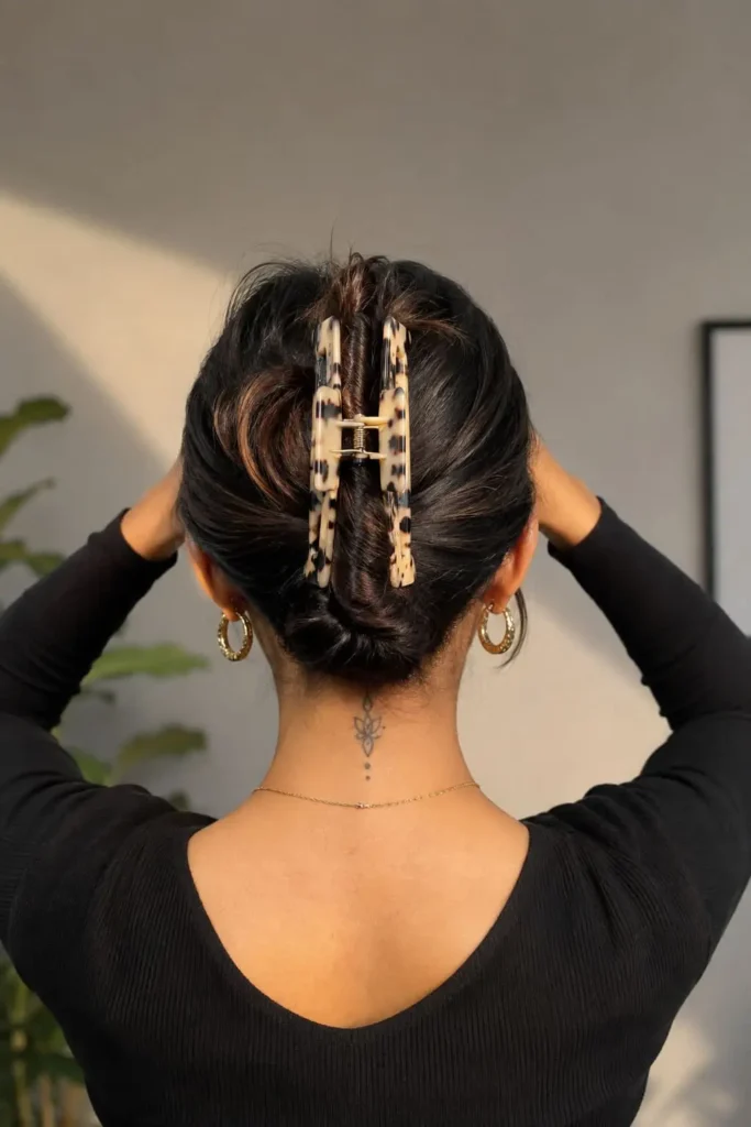 Claw clip chignon hairstyle for a professional work look