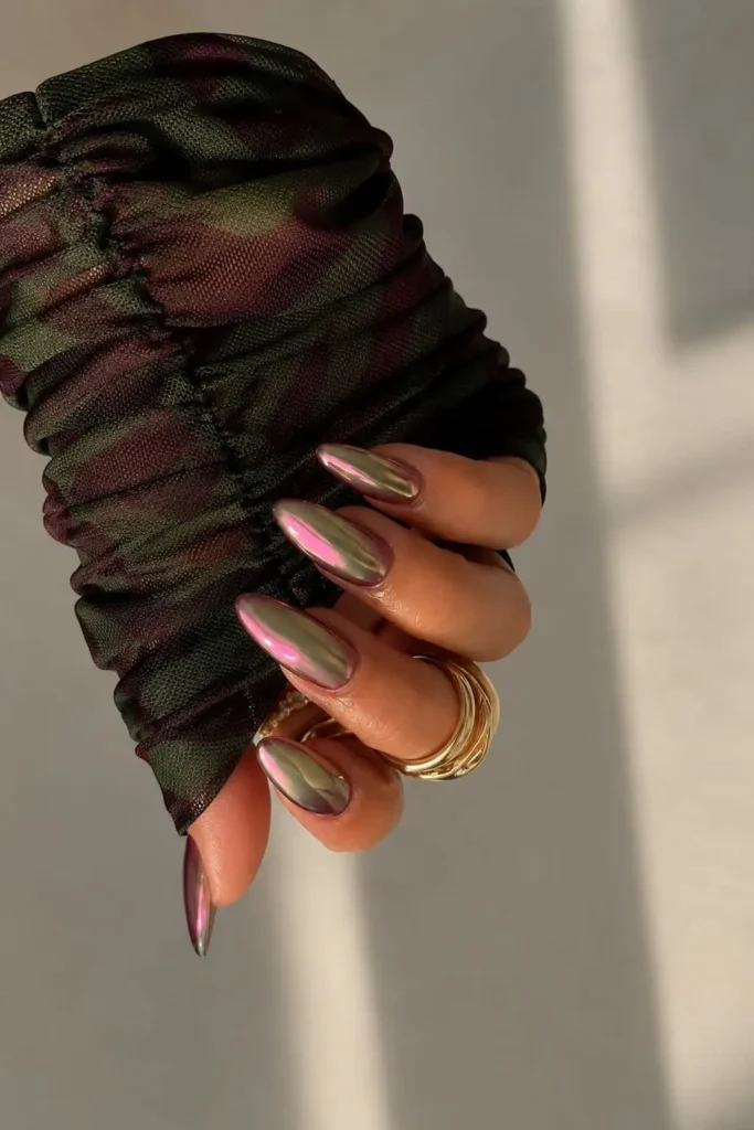 Elegant nude chrome gel nails with a soft reflective champagne finish