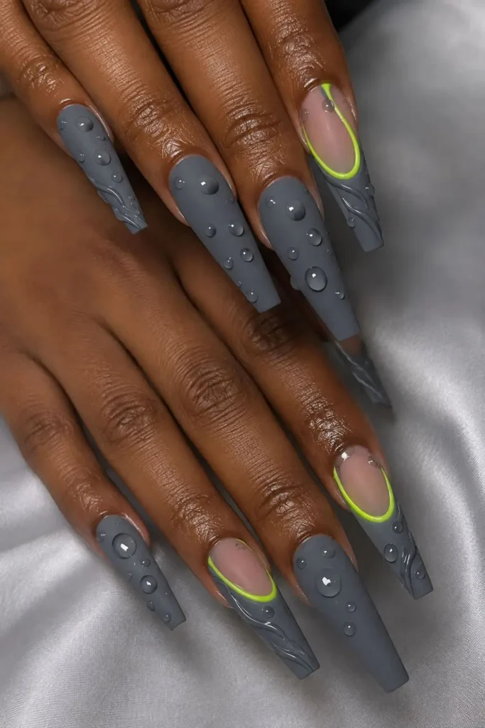 Gray coffin nail with glossy dew drops and lime green accents