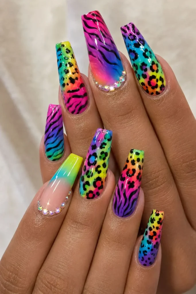 Lisa Frank inspired coffin nails with rainbow ombre and colorful accents