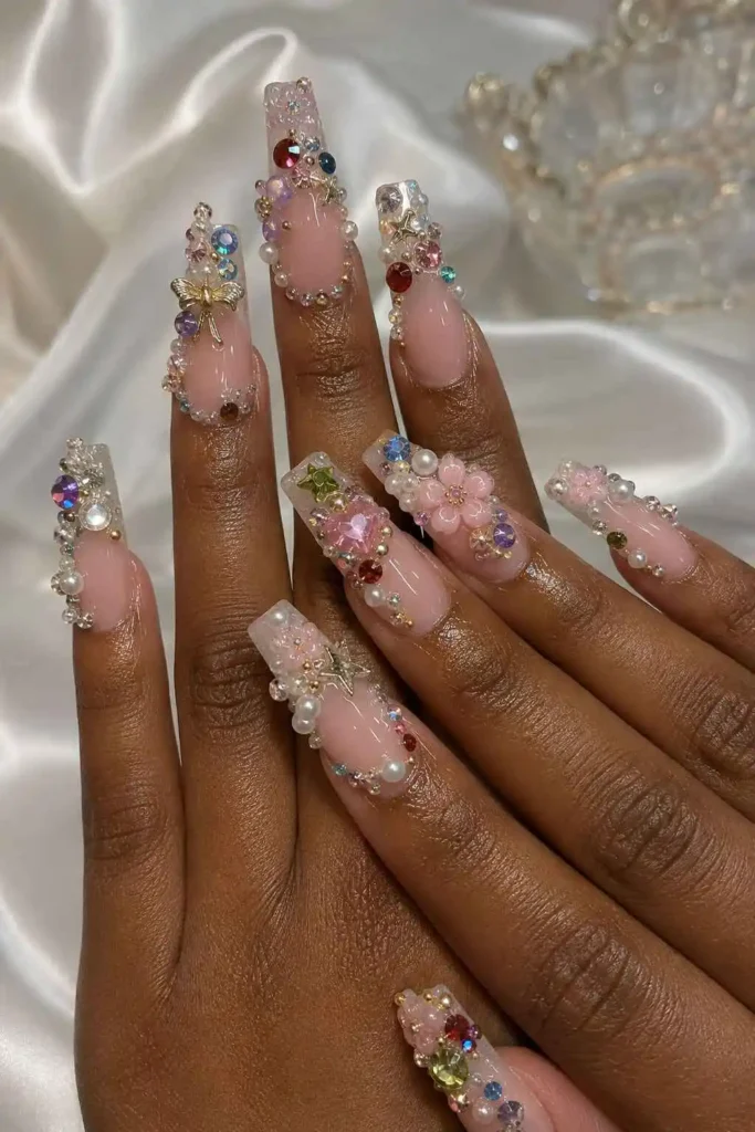 Maximalist coffin nails with rhinestones, 3D charms and gems
