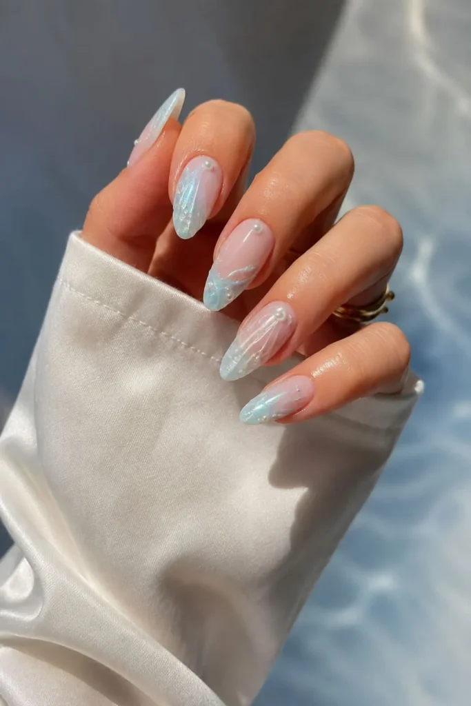 Mermaid Bath nails with pearly shimmer and ocean-inspired French tips