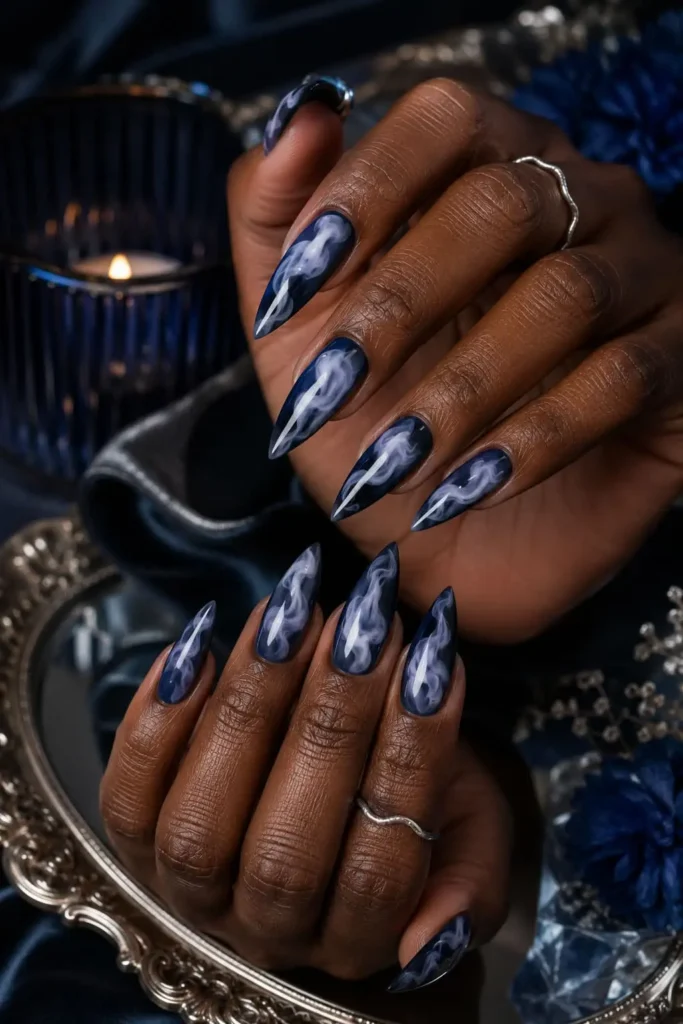 Midnight smoke birthday nails with lavender wisps and aurora shimmer