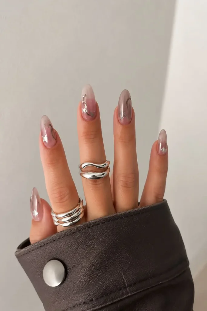 Shimmering star gel nails with a magnetic cat-eye base and bronze sparkle