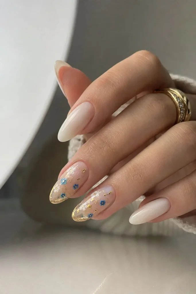 Bridal nails with delicate dried flowers embedded in clear gel