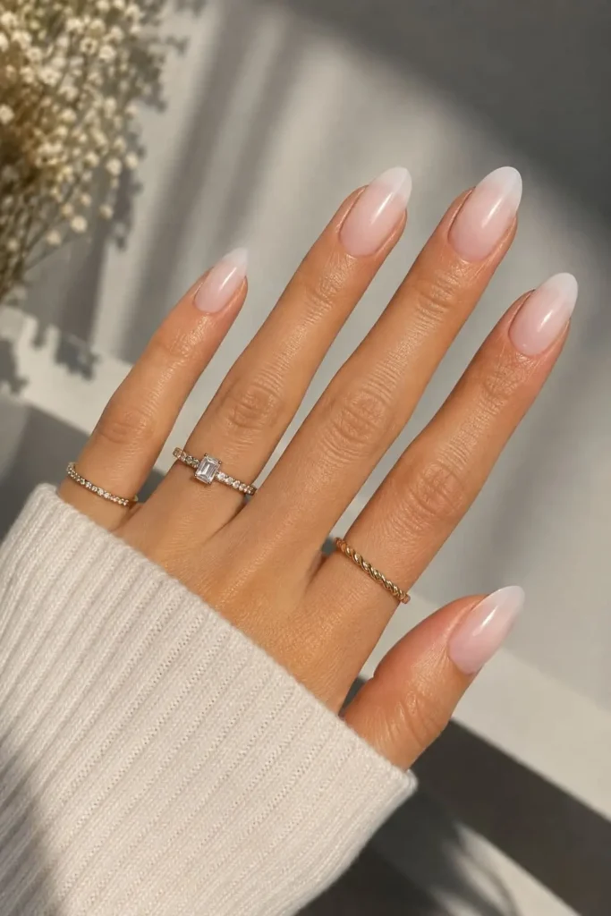 Milky white wedding nails with a soft translucent finish