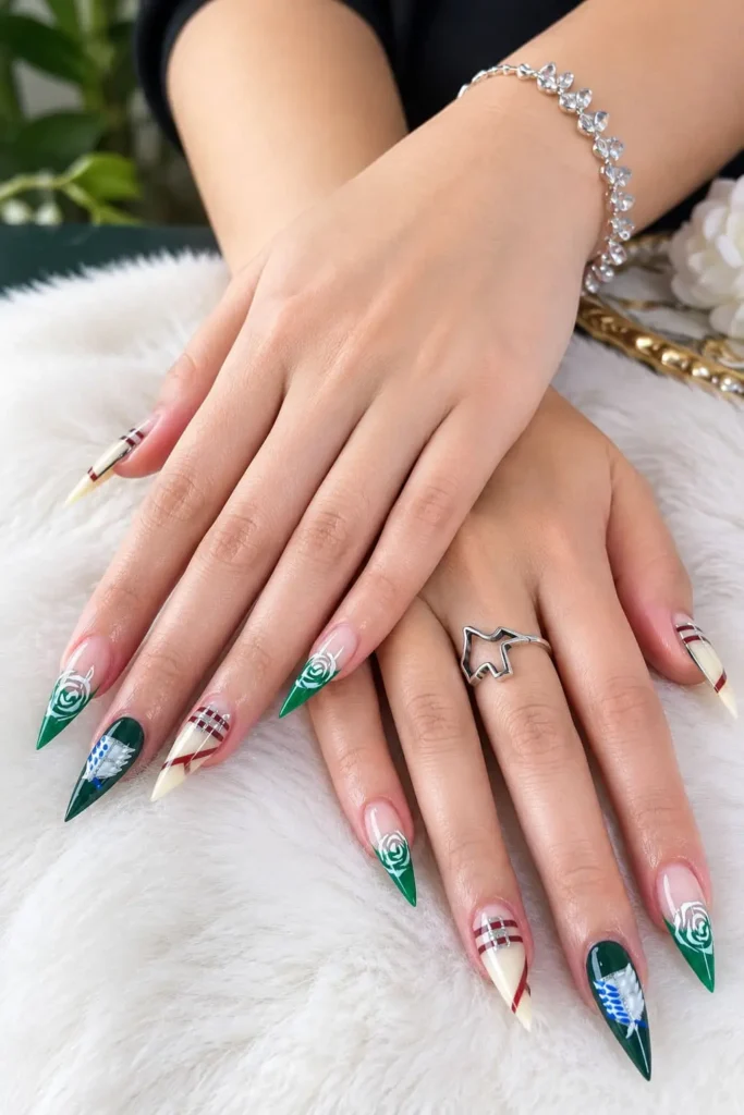 Attack on Titan nails with dark olive stiletto tips, Survey Corps logo and military-inspired details