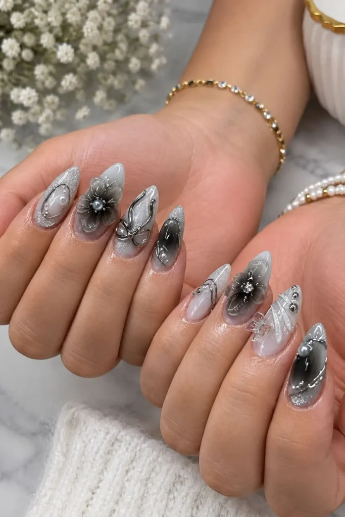 Black and white aura nails with a softly diffused white center and dark edges