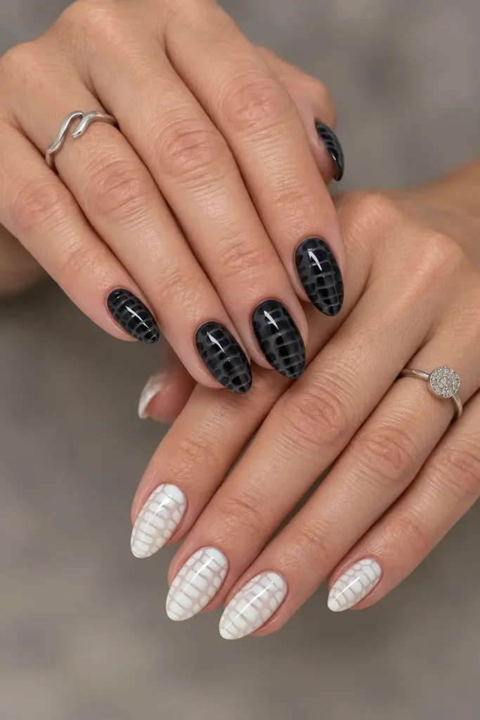 Black and white snakeskin nails with a detailed scale pattern