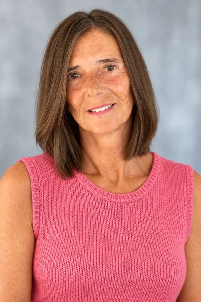 Classic shoulder-length haircut for women over 60 with straight hair