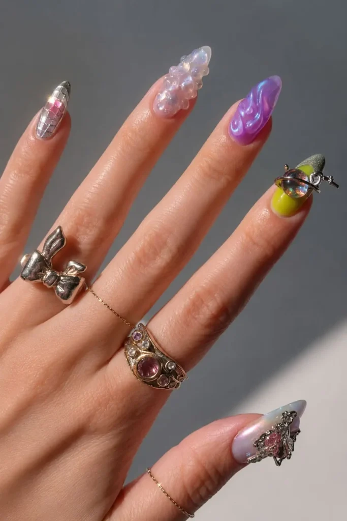 Double charm nail design with two decorative accents on one manicure