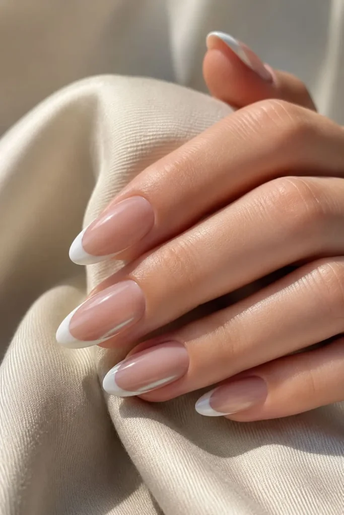 French tip cat eye nails with pink base and magnetic shimmer
