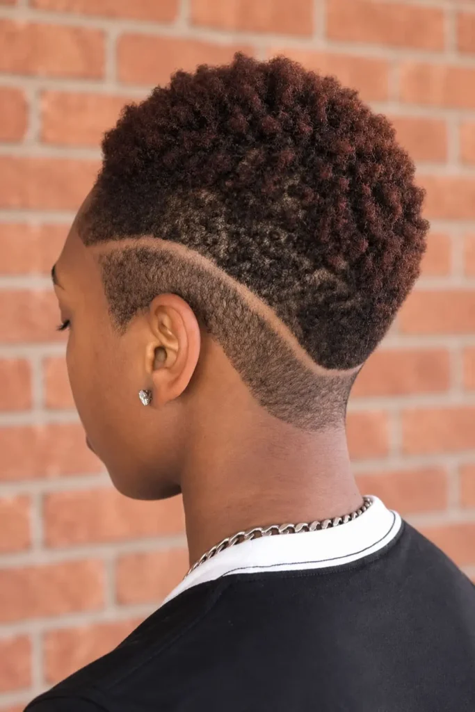 Gradient buzz cut with short sides for Black women over 50