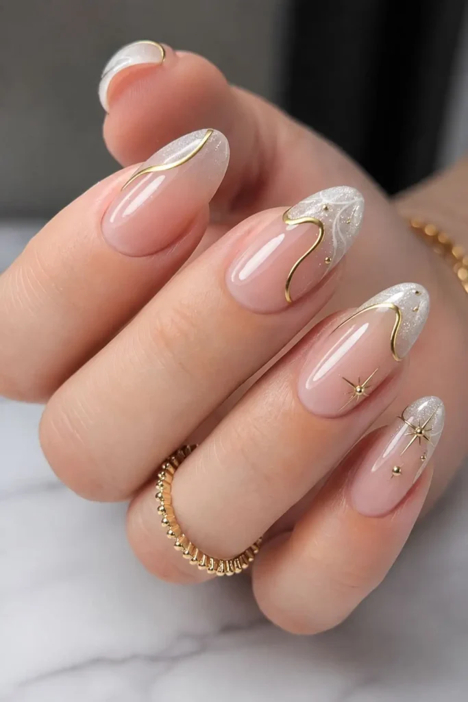 gray French tip cat eye nails with subtle gold chrome outlines