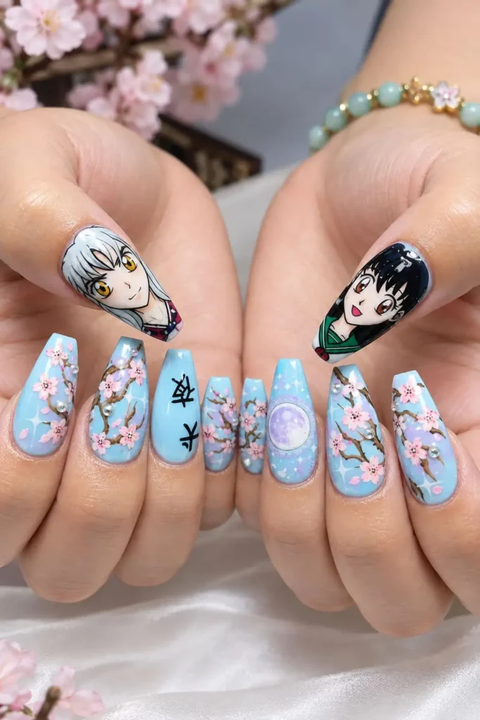 Inuyasha and Kagome nails with baby blue polish, cherry blossoms and romantic anime details