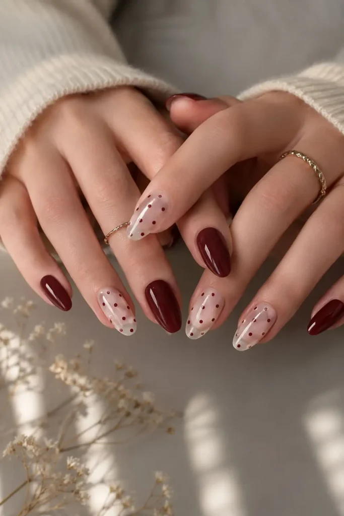 mixed finish cat eye nails with white shimmer red polish and dots