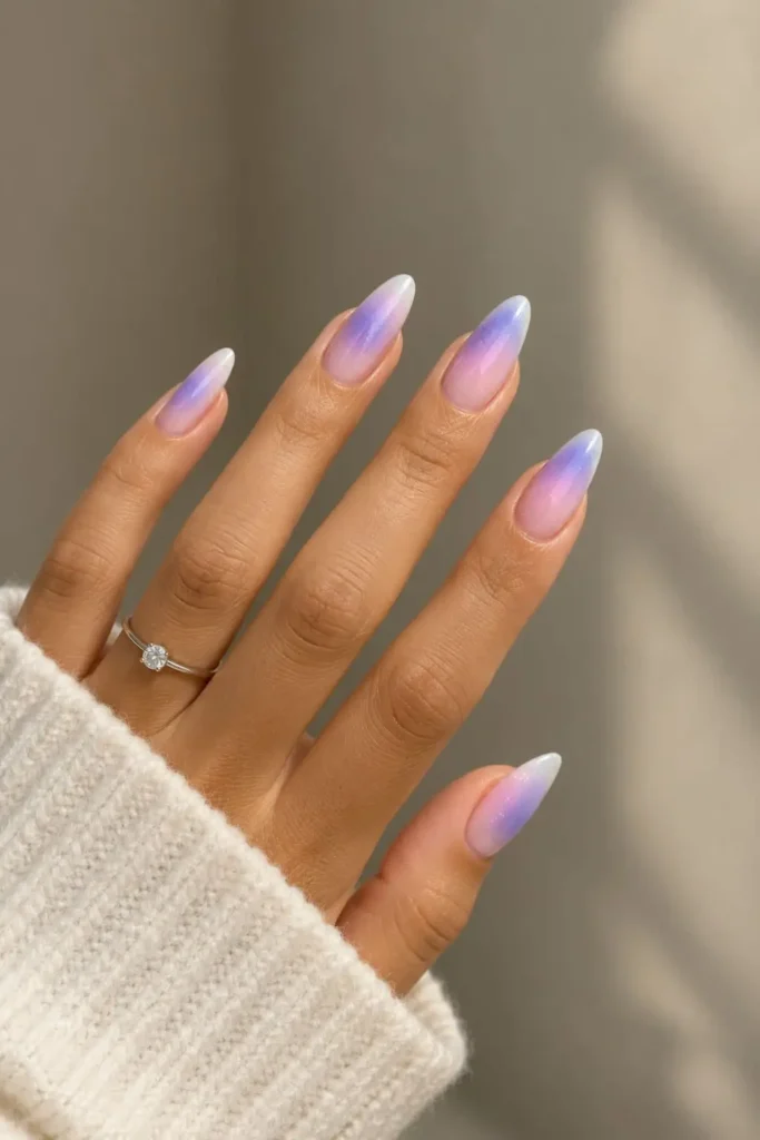 Purple and pink aura gel nails with a dreamy gradient effect