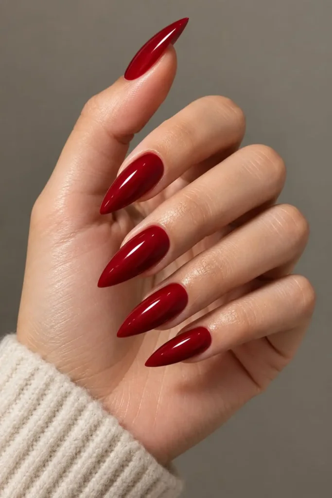 Red aura nails with glowing crimson and deep merlot color transitions