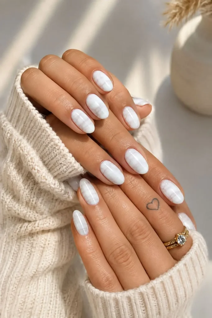 Short acrylic nails featuring a chic textured snakeskin pattern with intricate scales